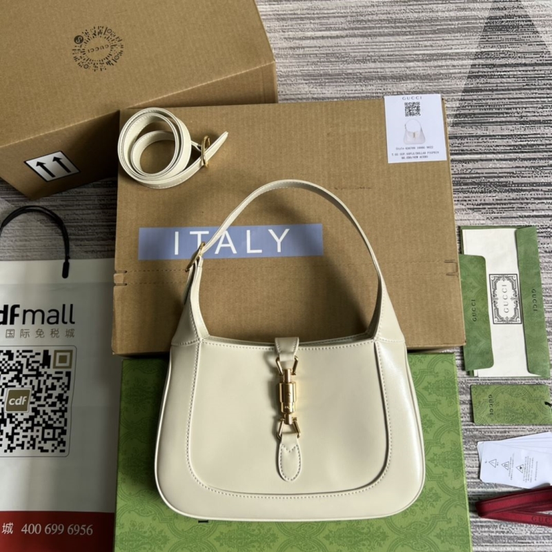 G*u*i top handle bags